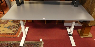 Lot 1248 - An IKEA desk, with electrically powered...