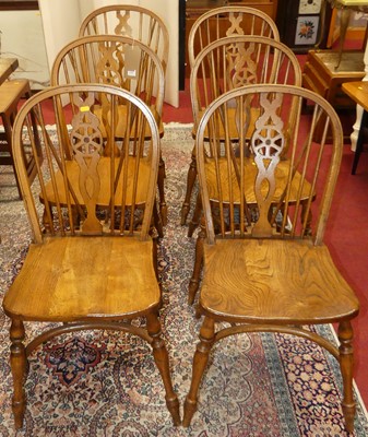 Lot 1255 - A set of six elm seat and beechwood wheel and...