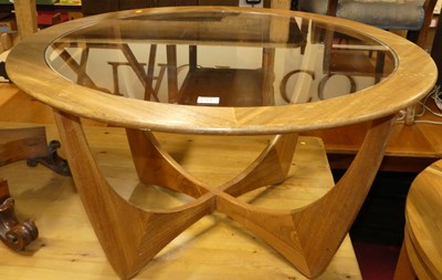 Lot 1264 - A G-Plan teak glass top circular occasional...