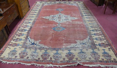 Lot 1160 - A Persian Zeigler woollen carpet (heavily...