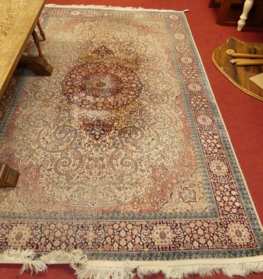 Lot 1162 - A Persian woollen Tabriz rug (faded), 280 x 186cm