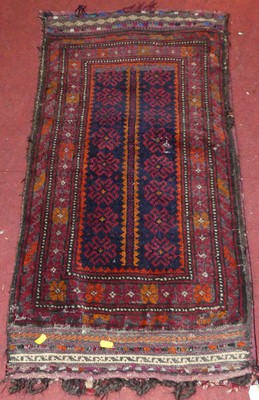 Lot 1166 - A Persian woollen sadllebag rug, 102 x 50cm