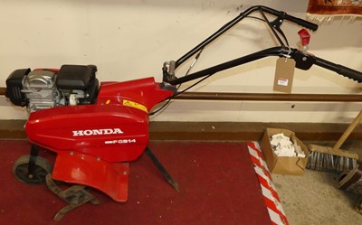 Lot 1167 - A Honda FG314 petrol driven garden rotavator