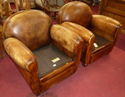 Lot 1312 - A pair of Art Deco tan leather upholstered...