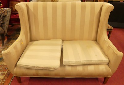 Lot 1300 - A late 19th century wing settee, upholstered...