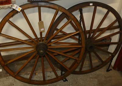 Lot 1168 - Two wooden coach wheels