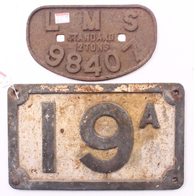 Lot 32 - Two cast iron plates, including a wagon D...