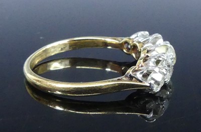 Lot A yellow and white metal diamond half-hoop...