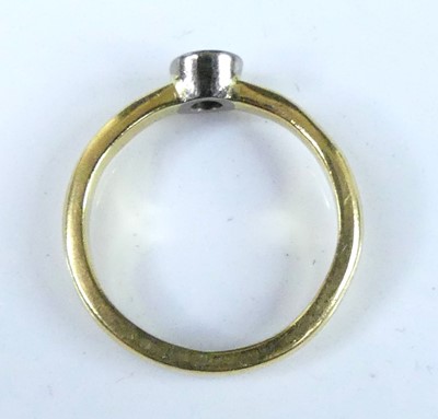 Lot 2514 - A yellow and white metal diamond solitaire...