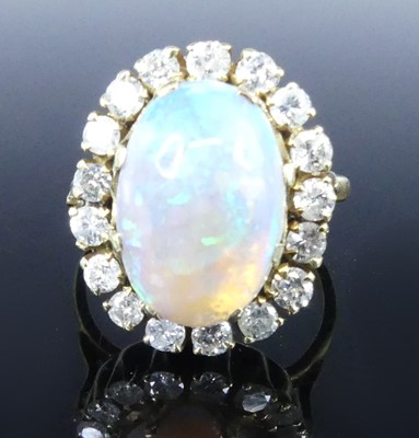 Lot An 18ct yellow and white gold, opal and...