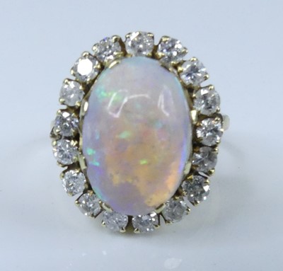 Lot An 18ct yellow and white gold, opal and...