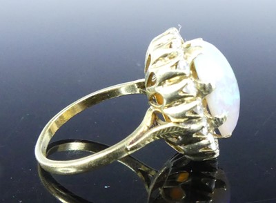 Lot An 18ct yellow and white gold, opal and...