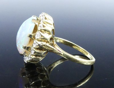 Lot An 18ct yellow and white gold, opal and...