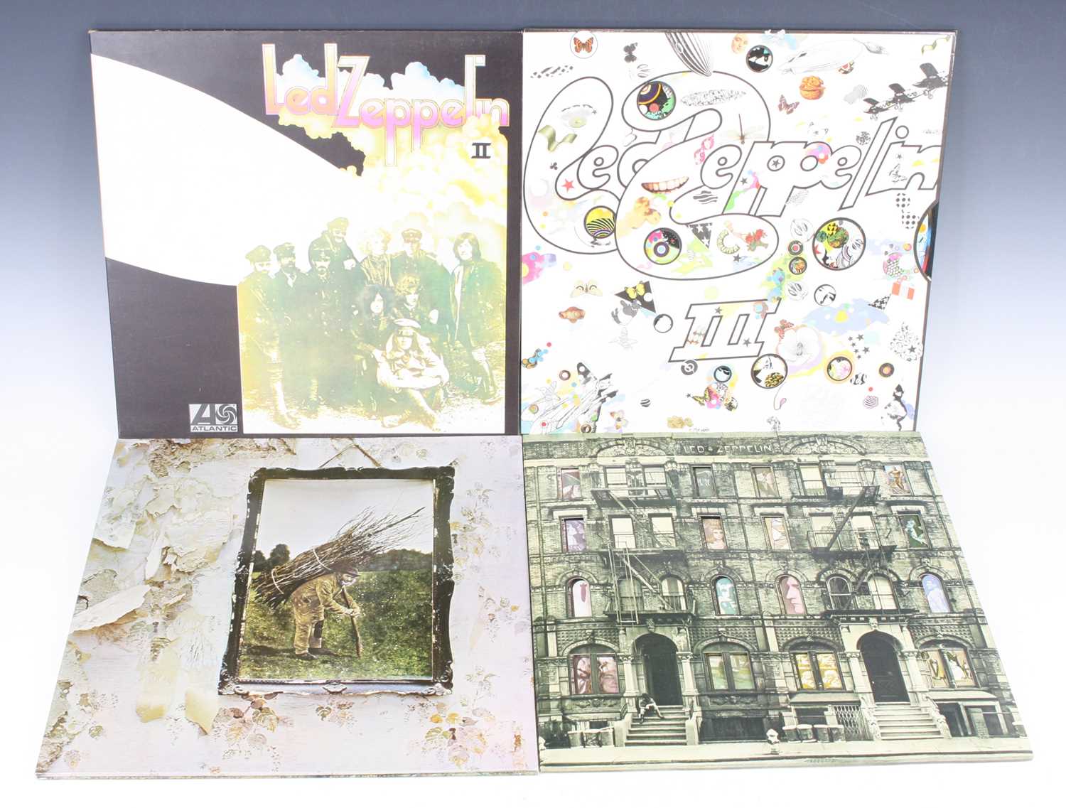 Lot 533 - Led Zeppelin, a collection of four LPs to...