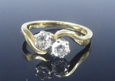 Lot 2566 - An 18ct yellow and white gold diamond...