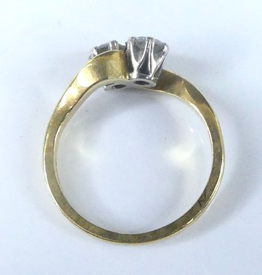 Lot 2566 - An 18ct yellow and white gold diamond...