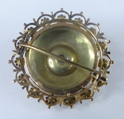 Lot 2567 - A yellow metal target brooch, comprising a...