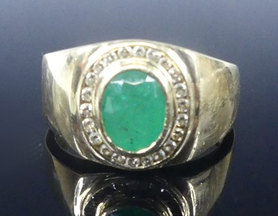 Lot 2568 - A yellow metal, emerald and diamond signet...