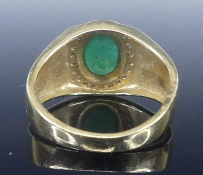 Lot 2568 - A yellow metal, emerald and diamond signet...