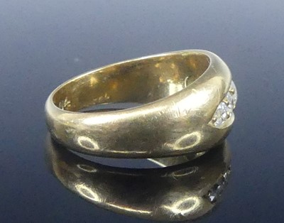 Lot 2573 - An 18ct yellow gold diamond half eternity ring,...