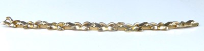 Lot 2576 - A yellow metal hollow cross and bar link...