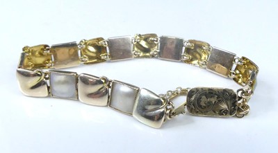 Lot 2578 - A yellow metal alternating square and mother...