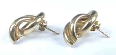 Lot 2581 - A pair of yellow metal hollow multi-circular...