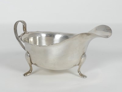 Lot 267 - An Elizabeth II silver saceboat, of helmet...