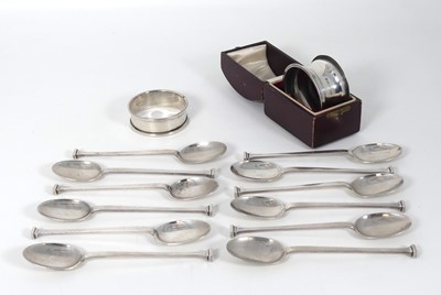 Lot 275 - A set of twelve George V silver coffee spoons,...