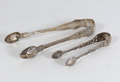 Lot 272 - A pair of William IV silver sugar tongs, in...