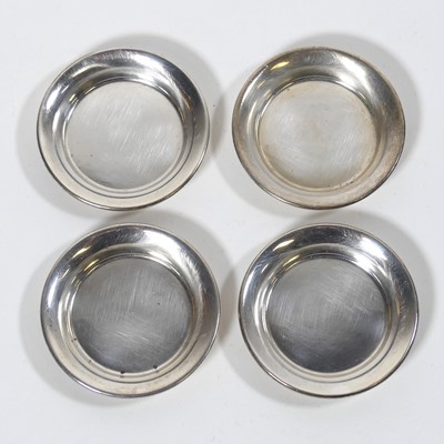 Lot 297 - A set of four George VI silver ashtrays, A...