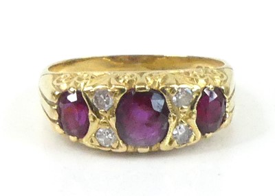 Lot An 18ct yellow gold, ruby and diamond...