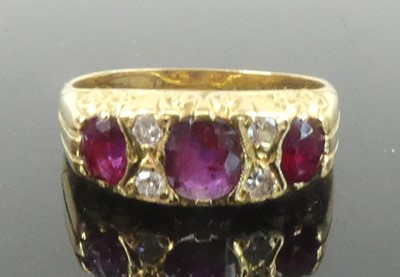 Lot An 18ct yellow gold, ruby and diamond...