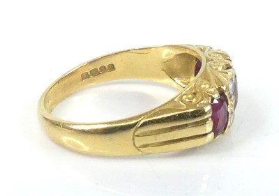 Lot An 18ct yellow gold, ruby and diamond...