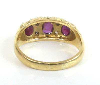 Lot An 18ct yellow gold, ruby and diamond...