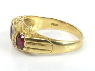 Lot An 18ct yellow gold, ruby and diamond...