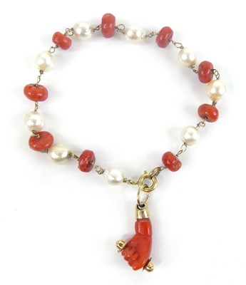 Lot 2589 - A yellow metal, coral and freshwater pearl...