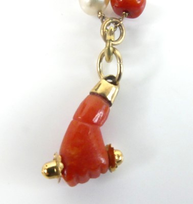 Lot 2589 - A yellow metal, coral and freshwater pearl...