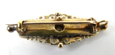 Lot A yellow metal diamond bar brooch, comprising...