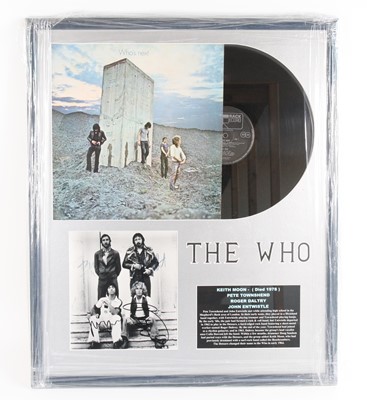 Lot The Who, a framed presentation to include...