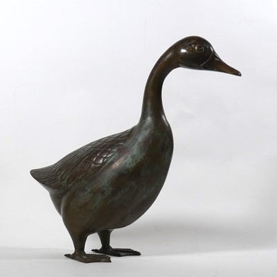 Lot 8 - A verdigris metal model of a goose, shown...