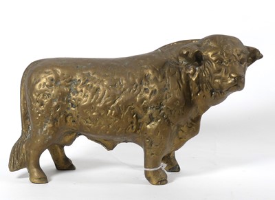 Lot 31 - A cast brass figure of a bull, modelled...