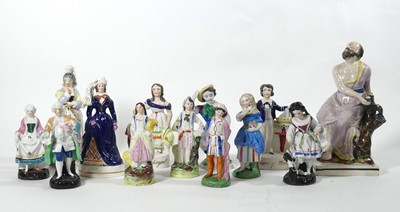 Lot 38 - A 19th century Staffordshire pearlware figure...