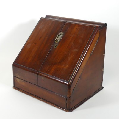 Lot 88 - A Victorian walnut table top stationery...