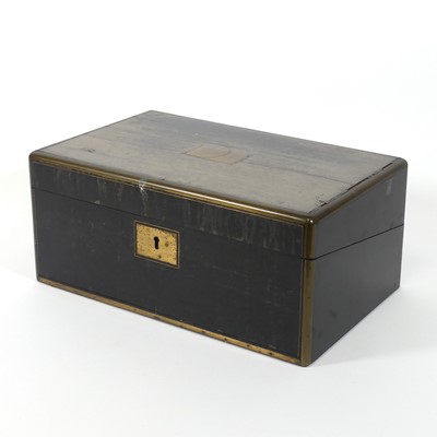 Lot 93 - A 19th century brass bound ebonised writing...