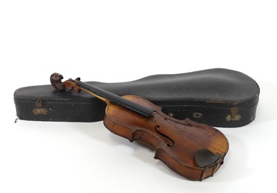 Lot 141 - A 19th century violin, having a carved lion's...