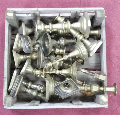 Lot 173 - A large collection of brass table candlesticks,...