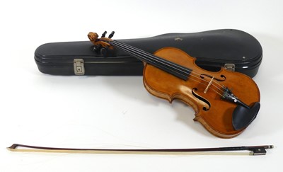 Lot 174 - A student's violin, having an ebonised...