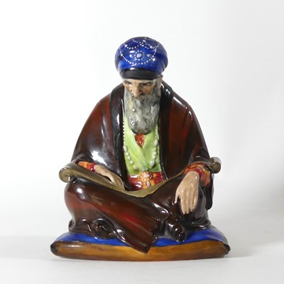 Lot 210 - Charles J. Noke for Royal Doulton, 'A Scribe'...