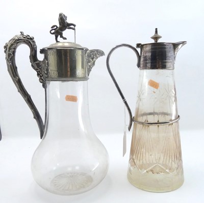 Lot 239 - A claret jug, having a clear glass body with...